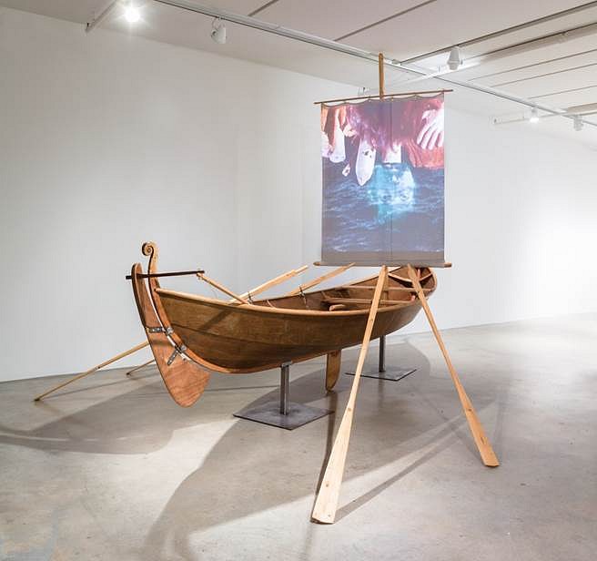 Jessica Segall
Paradise Begins With a Shipwreck, 2014
Wooden boat, projector, screen, 16 feet x 12 feet x 12 inches