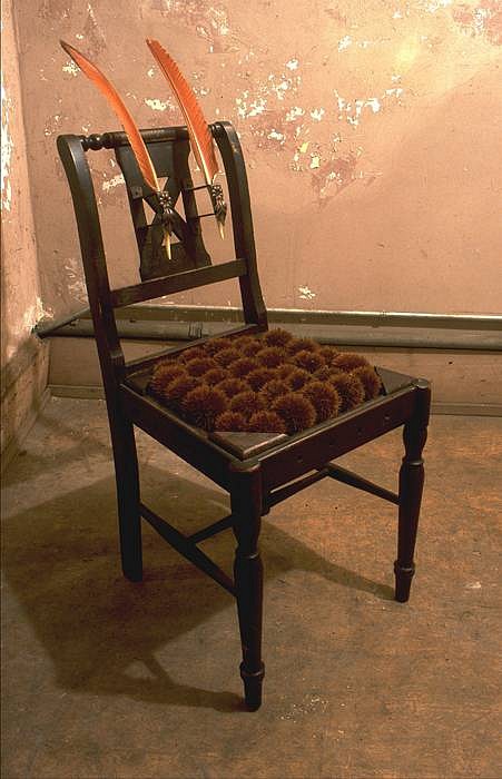 Janet Orselli
Release, 2002
chestnut burs, feathers, hardware, chair, 32 x 16 x 16 inches
detail from "Baggage" installation