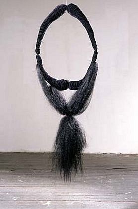 Renata Pedrosa
Sem Reflexo, 1997
velvet, cotton string, polyester, artificial hair, metal wire, 59 x 21 1/2 x 7 inches