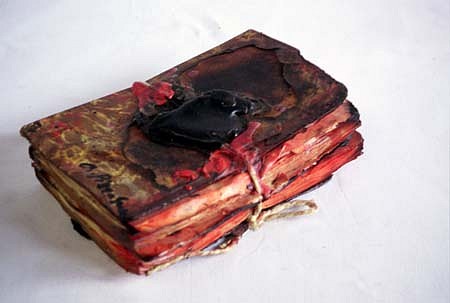 Alfredo Pizzo Greco
Burned Book, 2001
fire, tar, sealing wax, rope, 12 x 7 x 4 inches