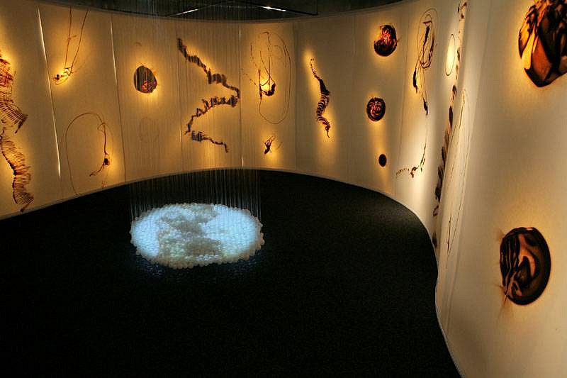 Etsuko Ichikawa
Walk with Mist, 2008
hand-blown glass, video projection, glass pyrograph on paper, filament, 144 x 384 x 276 inches