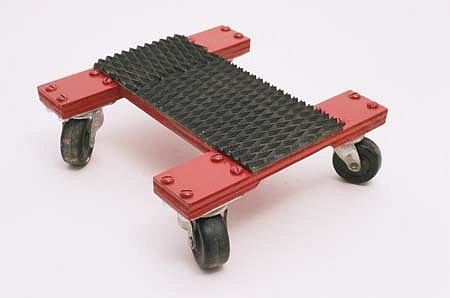 John Beech
Small Rolling Platform, 1998
plywood, casters, rubber, enamel, 12 x 9 x 3 1/2 inches