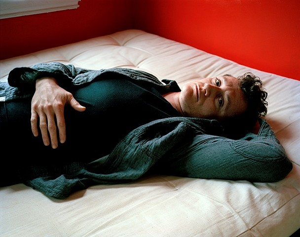 Jess T. Dugan
Dallas lying on the bed, 2012
archival pigment print, 20 x 24" or 32 x 40"