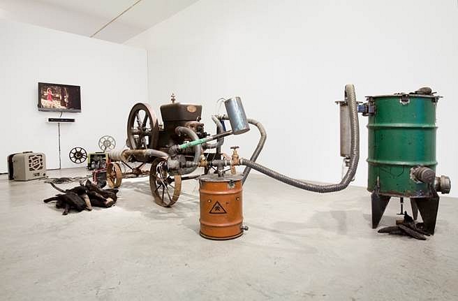 Jessica Segall
A Selfless, Reteaching Jet, 2010
Engine, inverter, downdraft gasifier, car battery, 16 mm projector, Dimensions variable