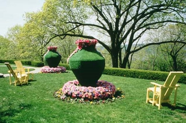 Roberley Bell
Arcadia Now, 2000
real and artificial turf, flowers, and chairs