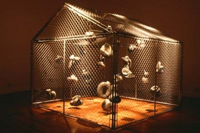 Roberley Bell
Disputed Territories, 1996
found objects, mixed media, and chain link, 10' x 10' x 12'