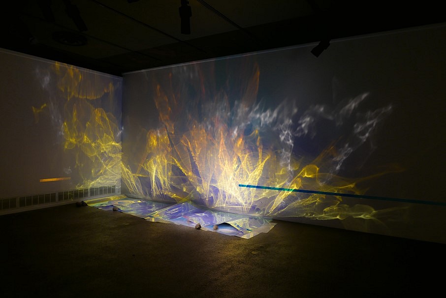 Charles Matson  Lume
west gallery view of ""what opens - like a blaze of fire (for Joyce Sutphen & Galilee Peaches)"", 2021
3M reflective material, unknown reflective material, 2-billion-year-old MN granite, hologram tape, proofing paper, dimensions variable